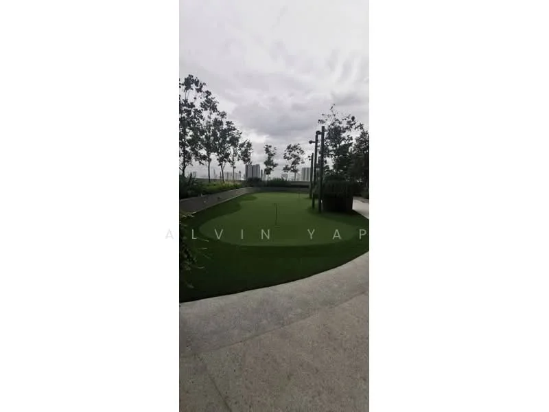 Exterior type: landscape garden; features: artificial grass lawn, putting green area, landscaped garden, trees and shrubs, concrete pathway, outdoor lighting fixtures; style: modern.