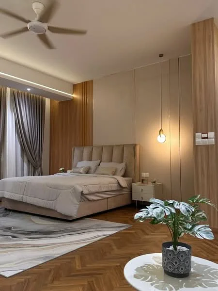 Bedroom features: king-size bed with upholstered headboard, bedside tables with lamps, floor-to-ceiling windows with sheer curtains, wood paneling on walls, recessed lighting, ceiling fan, area rug with abstract pattern, decorative plant in ceramic pot, wooden flooring, pendant light fixture; style: modern.