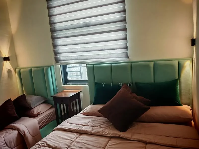 Bedroom features: green upholstered headboard, two single beds with beige bedding, decorative pillows in dark brown and green, nightstand with drawer, blackout roller blinds, wall-mounted sconces, light green walls, carpeted flooring; style: modern; view: city.