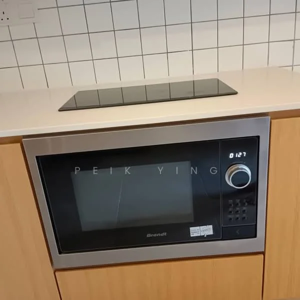 Kitchen features: built-in microwave, stainless-steel finish, black glass cooktop, light wood cabinetry, white countertop, white tiled backsplash; style: modern.