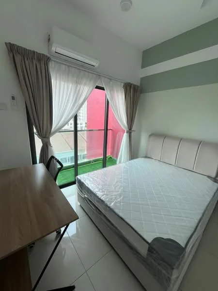 Bedroom features: queen-size bed, upholstered headboard, floor-to-ceiling windows, sheer curtains, wall-mounted split AC, study desk, wooden desk, tile flooring, green accent wall, white painted walls; style: modern; view: garden.