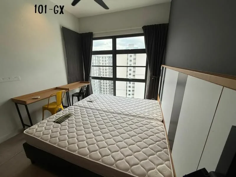 Bedroom features: two single beds, black bed frame, mattresses without bedding, study desk with wooden top, yellow chair, floor-to-ceiling windows, black curtains, grey accent wall, light-colored tiled flooring, ceiling fan; style: modern; view: city.