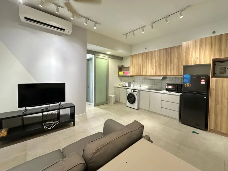 Living features: 3-seater fabric sofa in grey, coffee table, wall-mounted TV, TV console, recessed LED downlights, ceiling fan, floor-to-ceiling windows, area rug, open-plan layout, tile flooring; style: modern. Kitchen features: white shaker cabinets, stainless-steel fridge, built-in oven, freestanding washing machine, ceramic tile backsplash, granite countertop, single-bowl stainless-steel sink, chrome pull-down faucet, 4-burner gas hob, microwave; style: modern. Room features: grey painted walls, tile flooring.
