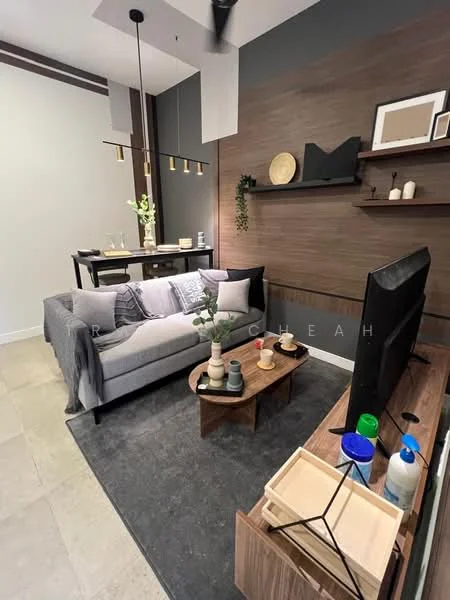 Living features: 3-seater fabric sofa in grey, wooden coffee table, area rug in grey, wall-mounted TV, TV console in wood, shelves with decorative items, pendant lighting with multiple bulbs, decorative wall art, potted plant, dining table with chairs in background, neutral painted walls, tile flooring; style: modern.