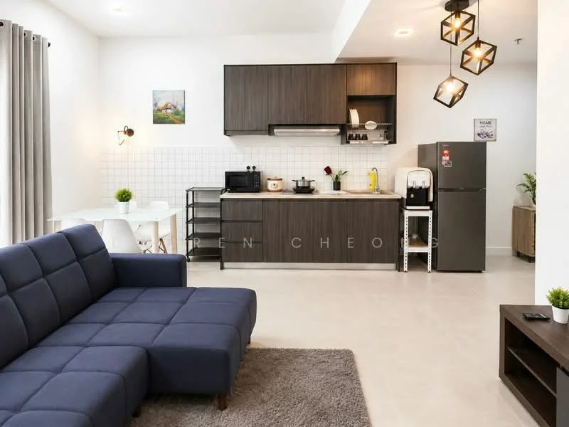 Kitchen features: grey cabinetry, white tiled backsplash, stainless-steel sink, chrome pull-down faucet, built-in stove, microwave, refrigerator, countertop with appliances, open shelving, dining table with white chairs, grey area rug, sofa in navy blue, pendant lighting, wall-mounted artwork; style: modern.