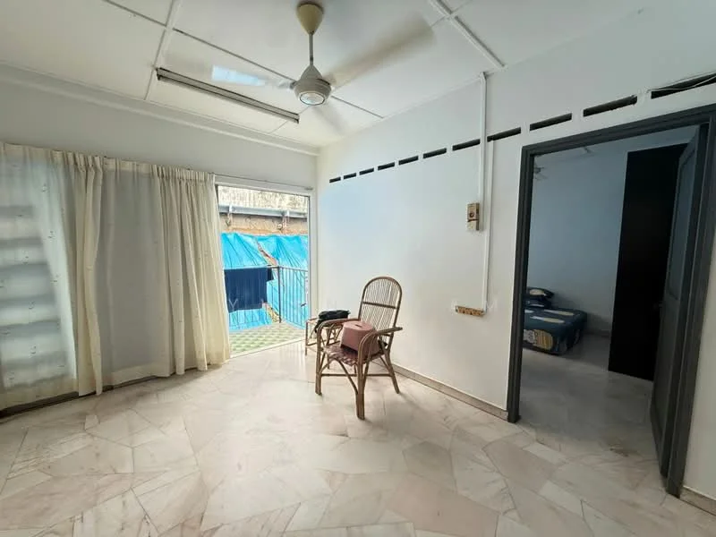 Room features: white painted walls, marble flooring, ceiling fan, large window with sheer curtains, wooden chair, folded towel on chair, doorway leading to another room.
