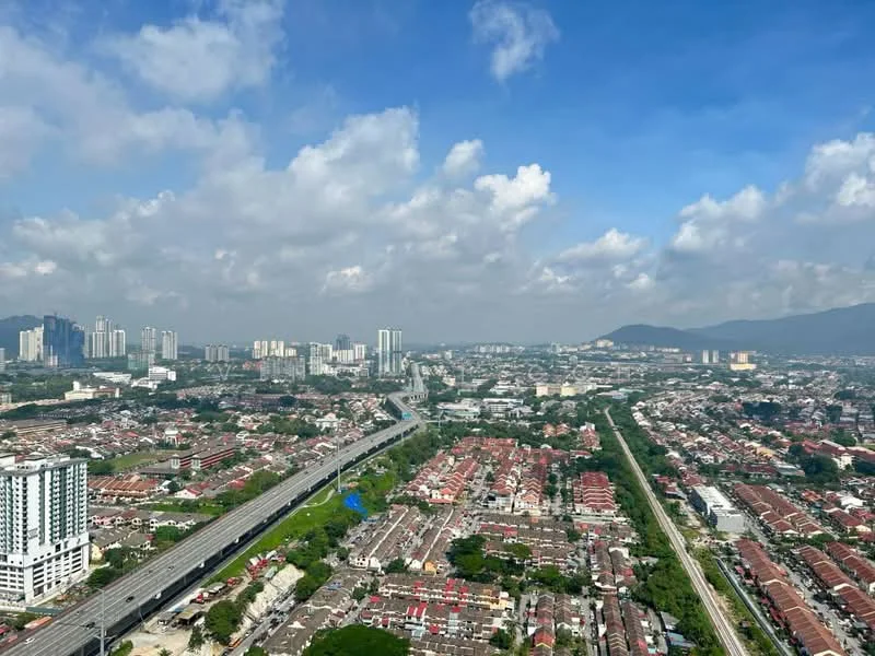 Exterior type: high-rise condominium; features: city skyline view, surrounded by residential areas, highway visible, mountain in background, clear blue sky, clouds, urban landscape; style: modern.