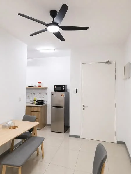 Dining features: dining table with light wood finish, 2 grey upholstered dining chairs, white walls, tile flooring, 5-blade ceiling fan with integrated LED light, refrigerator, kitchenette with wooden cabinetry, countertop with kitchen appliances; style: modern.