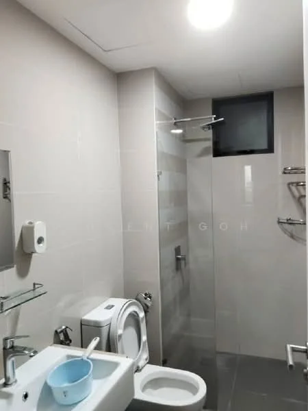 Bathroom features: white ceramic toilet, single-sink vanity with wall-mounted mirror, chrome basin mixer faucet, walk-in shower with glass enclosure, rain shower head, tiled walls in light grey, grey tile flooring, wall-mounted towel rack, soap dispenser, small window for ventilation; style: modern.