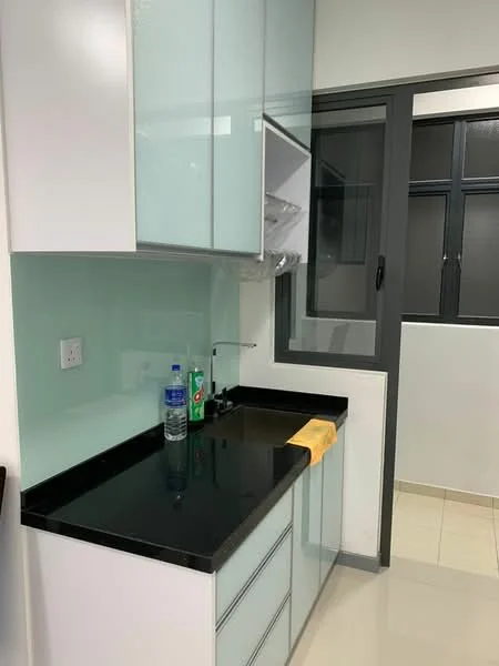 Kitchen features: black granite countertop, white cabinetry with glass doors, single-bowl stainless-steel sink, chrome pull-down faucet, green backsplash, window with black frame, water bottle on countertop, cleaning supplies on countertop, tile flooring, under-cabinet lighting; style: modern.