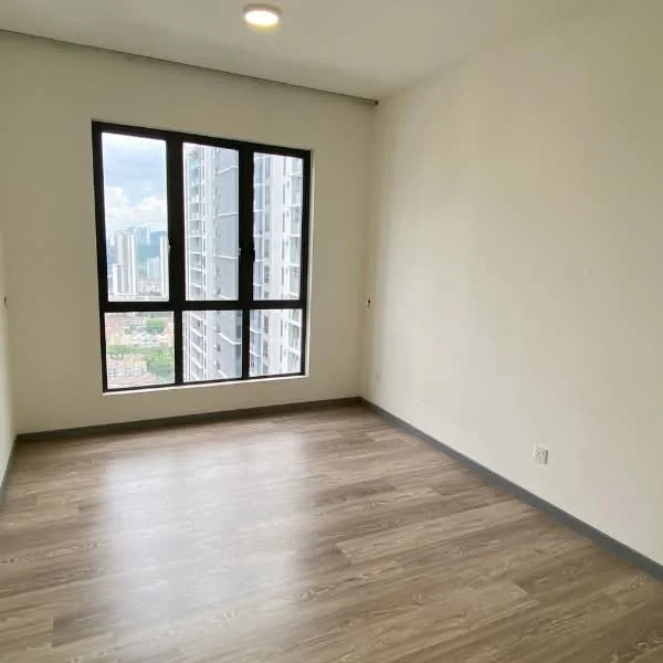 Room features: laminate flooring, white painted walls, floor-to-ceiling windows, city view, recessed ceiling light; style: modern; view: city.