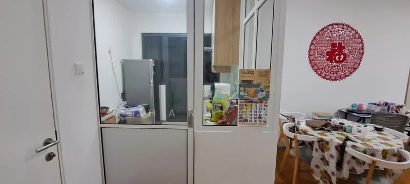 Room features: glass sliding door, white walls, wooden cabinetry, stainless-steel fridge, table with chairs, decorative wall art, various items on table, open shelving, flooring in wood, kitchen items visible; style: modern.
