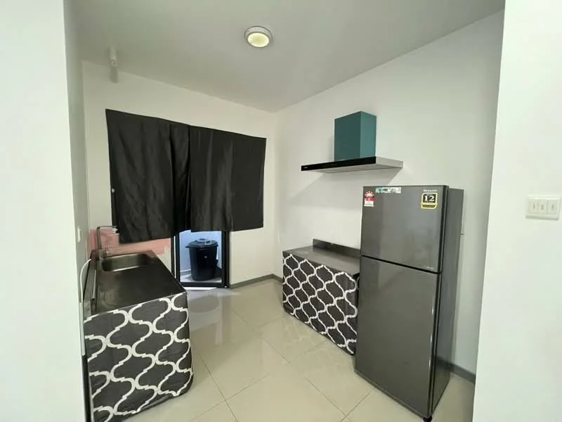 Kitchen features: single-bowl stainless-steel sink, chrome faucet, grey fridge, black countertop, white walls, glossy tile flooring, black curtains, open shelving, kitchen cabinetry with patterned design; style: modern.