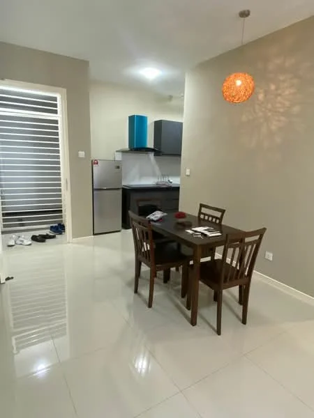 Dining features: 4-seater wooden dining table, wooden dining chairs, pendant light fixture, glossy white tile flooring, cream painted walls, refrigerator, kitchen cabinetry in dark grey, kitchen countertop, open layout to kitchen, sliding door to hallway; style: modern. Kitchen features: stainless-steel refrigerator, dark grey kitchen cabinets, white countertop, built-in stove, wall-mounted kitchen hood; style: modern.