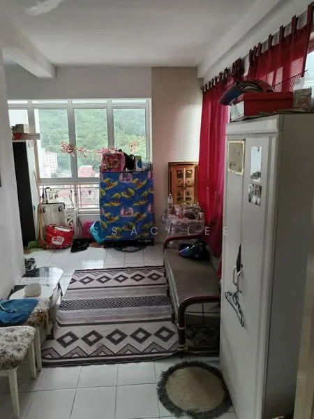 Room features: large windows with city view, red curtains, white walls, tiled flooring, area rug with geometric pattern, wooden bench, storage cabinet, clothes rack, decorative items on shelves, small table, various items on the floor; style: modern; view: city.