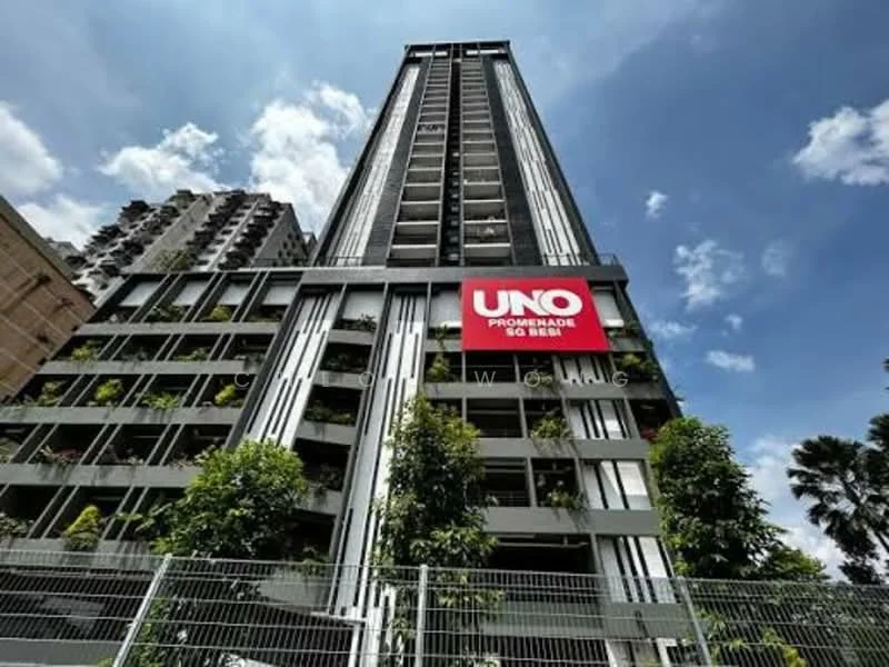 Exterior type: high-rise condominium; features: glass curtain wall, white painted facade, vertical fins, recessed balconies, landscaped greenery at balconies, signage on facade, surrounded by mature trees, modern architectural design; style: modern.