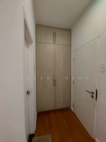 Room features: light wood cabinetry, white walls, wooden flooring, door with silver handle, built-in storage cabinet, minimalist design; style: modern.
