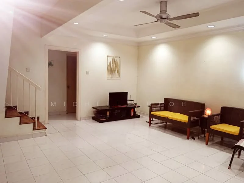 Living features: white painted walls, white tiled flooring, 5-blade ceiling fan, sofa with yellow cushions, wooden coffee table, TV console, wall-mounted TV, decorative artwork on wall, staircase leading to upper floor, lamps on side tables; style: modern.