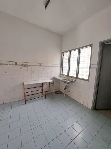 Kitchen features: white tiled walls, light blue tiled flooring, single-bowl stainless-steel sink, chrome faucet, metal shelving unit, window with horizontal slats, plain white ceiling, no visible appliances.
