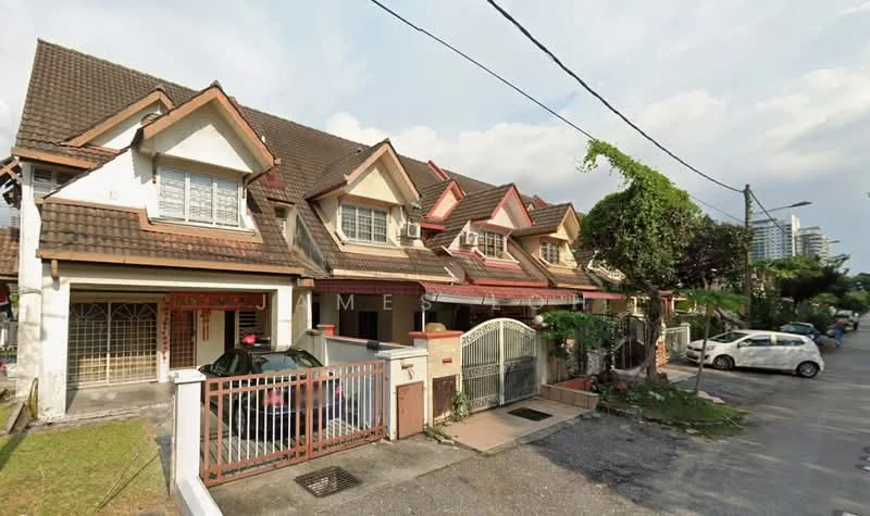 Exterior type: linked terrace house; features: red brick facade, pitched tile roof, two-storey, front garden area, driveway with interlocking pavers, fenced front yard, multiple air conditioning units visible, mature trees in vicinity, surrounded by residential area, street view with parked cars; style: traditional.