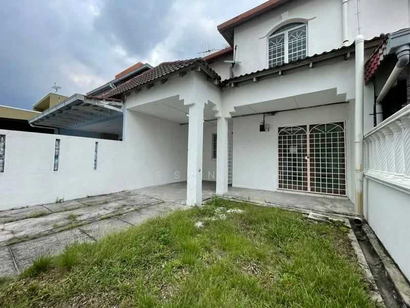 Exterior type: semi-detached house; features: white painted facade, gabled roof, concrete flooring, grassy yard area, covered porch, metal grille door, windows with metal grilles, exposed concrete walls, paved walkway, surrounding fencing; style: modern.
