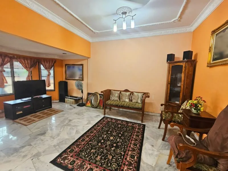 Living features: orange painted walls, marble flooring, tray ceiling, recessed downlights, 3-blade ceiling fan, floor-to-ceiling windows with sheer curtains, wall-mounted TV, black TV console, decorative mirror, area rug with intricate pattern, wooden sofa with upholstery, wooden armchair, wooden side table, decorative flower arrangement; style: traditional.