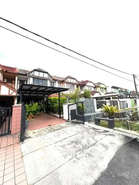 Exterior type: linked terrace house; features: car porch with awning, manicured landscaping, paved driveway, fenced perimeter, garden area with plants, multi-storey linked terrace, front entrance gate, visible neighboring houses; style: modern.