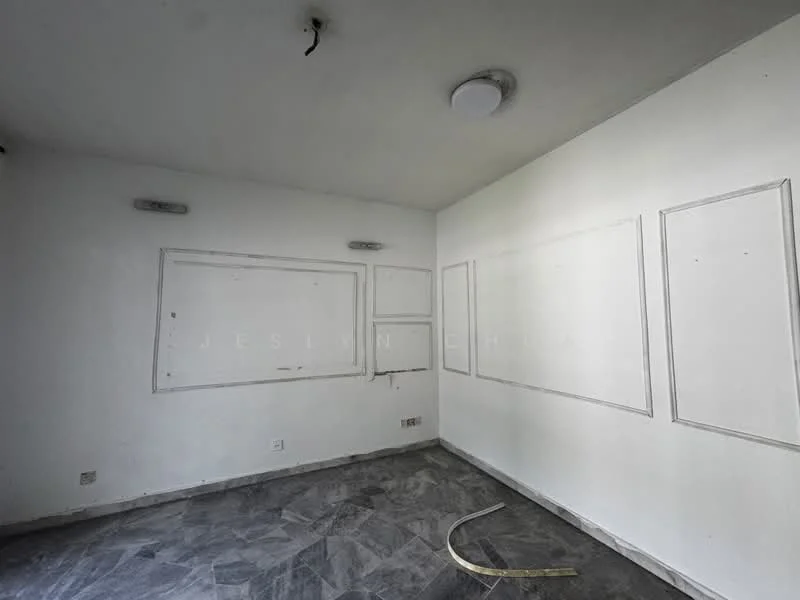 Room features: white painted walls, marble tile flooring, ceiling light fixture, wall-mounted light fixtures, empty wall frames, corner electrical outlet.