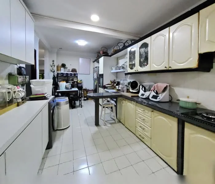 Kitchen features: white cabinetry with raised panel doors, black countertop, stainless-steel sink, chrome faucet, built-in stove with hood, microwave, rice cooker, kettle, dishwasher, dining table, tile flooring, recessed ceiling lights, open shelving, wall-mounted storage, window with sheer curtains; style: modern.