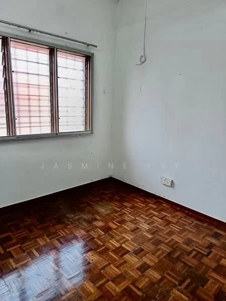 Room features: white painted walls, parquet wood flooring, window with horizontal slats, single electrical outlet, ceiling hook for light fixture.