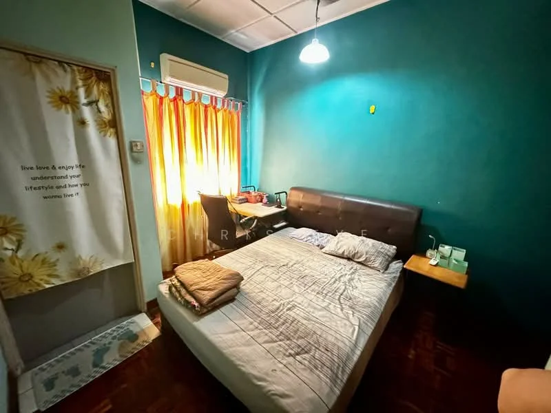 Bedroom features: queen-size bed, upholstered headboard, wooden bedside table, desk with chair, floor-to-ceiling window with sheer curtains, light fixture, painted walls in teal, wooden flooring, air conditioning unit; style: modern.