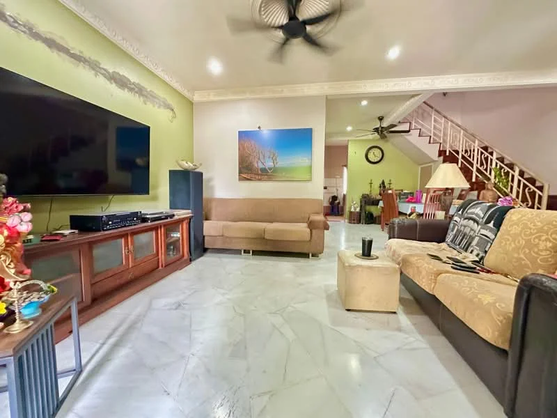 Living features: marble flooring, green painted walls, white ceiling with crown moulding, 5-blade ceiling fan, wall-mounted TV, wooden TV console, sofa with patterned upholstery, beige fabric sofa, coffee table, decorative artwork on wall, floor lamp, staircase in background; style: contemporary.