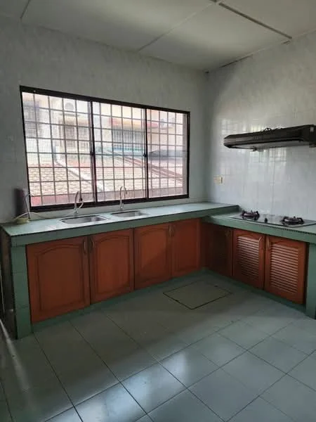 Kitchen features: double-bowl stainless-steel sink, chrome pull-down faucet, green laminate countertop, wood cabinetry with brown finish, gas stove with two burners, white tiled backsplash, grey ceramic tile flooring, large window with metal grille, under-cabinet lighting; style: traditional.