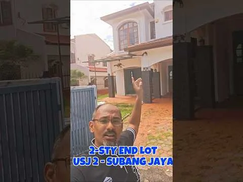 Exterior type: detached bungalow; features: two-storey building, white painted facade, red tiled roof, front porch, manicured lawn, brick pathway, fenced perimeter, garden area, driveway, balcony on upper floor; style: modern.