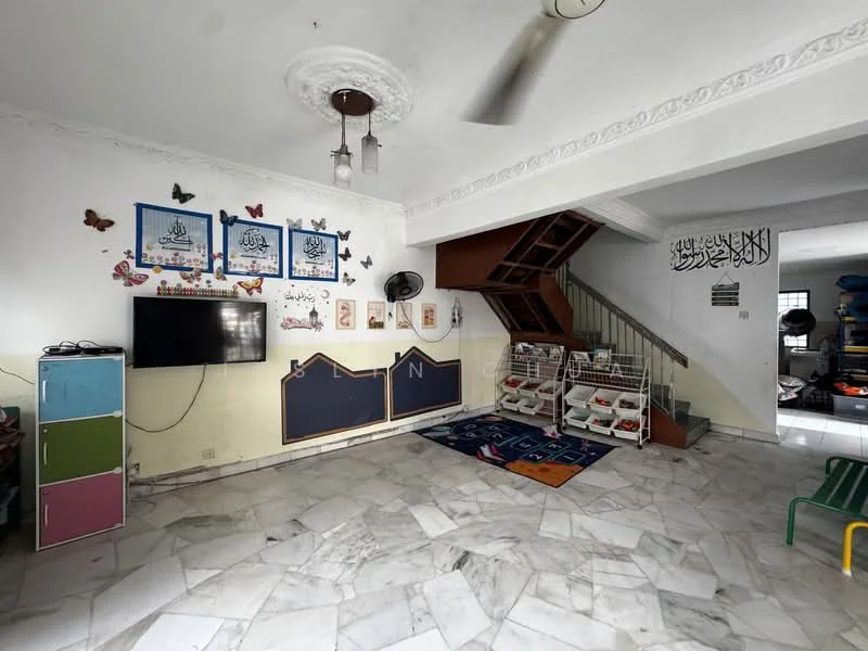Living features: marble flooring, white painted walls, ceiling fan, wall-mounted TV, decorative wall art, staircase, open space layout, colorful storage cabinet, children's play area with rug, built-in shelving unit.