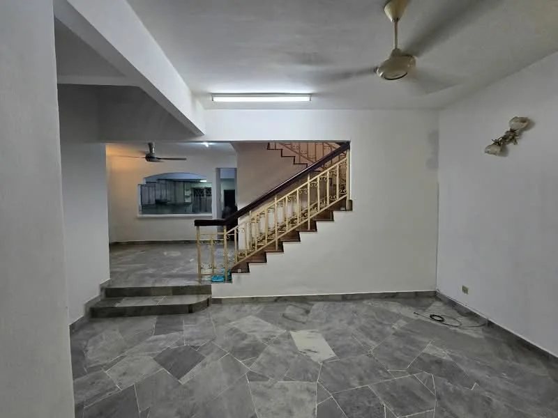 Room features: grey stone flooring, white painted walls, ceiling with fluorescent lighting, ceiling fan, staircase with wooden railing, open layout, multiple ceiling lights, large window, steps leading to another level; style: modern.