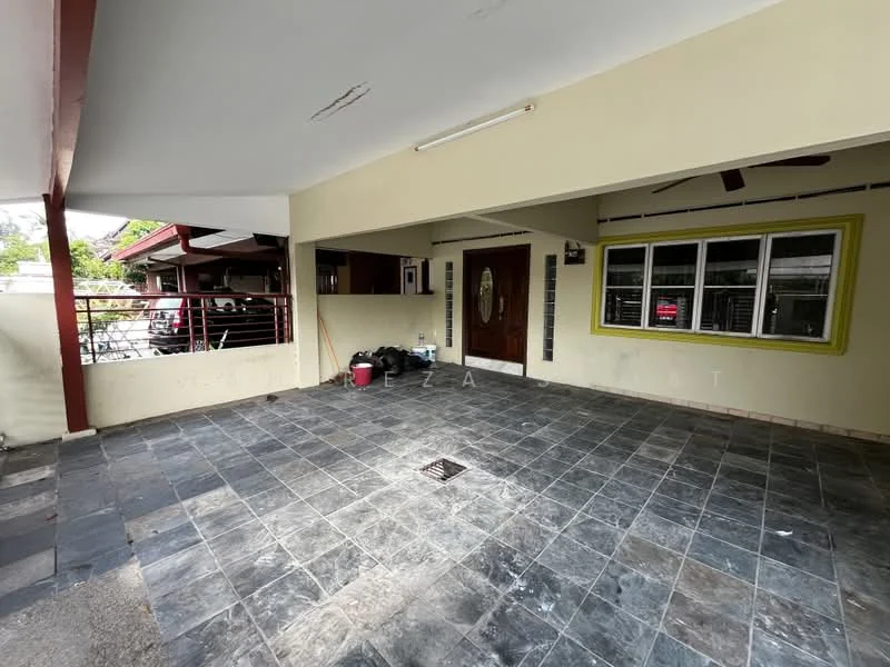 Exterior features: paved flooring, covered porch area, sliding glass door, wooden door with decorative glass, ceiling fan, exposed beams, yellow accent wall, outdoor space with drainage, surrounding greenery; style: modern.