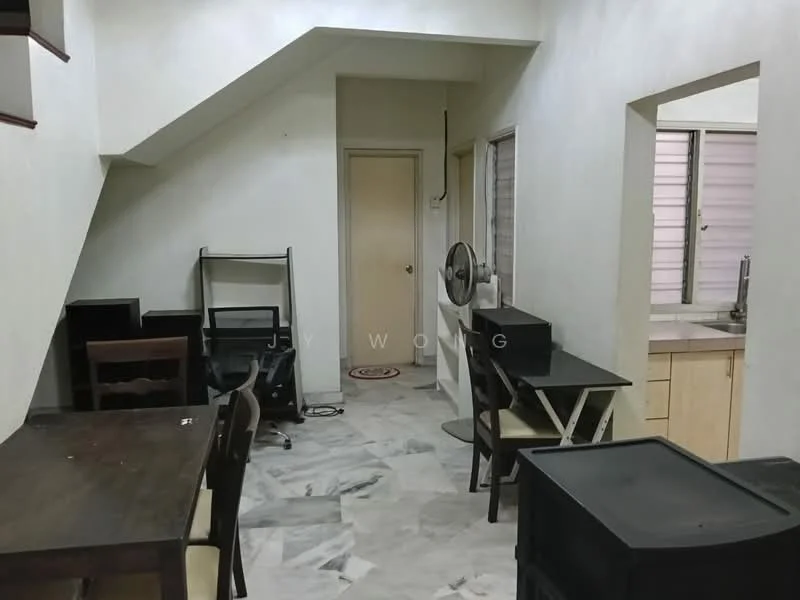 Room features: white painted walls, marble flooring, staircase, ceiling fan, two windows, wooden dining table, black chairs, white cabinetry, kitchen countertop, small sink.