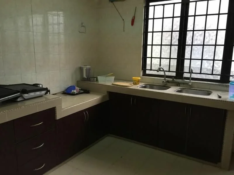 Kitchen features: double-bowl stainless-steel sink, chrome pull-down faucet, laminate countertop, dark wood cabinetry, built-in cabinets, ceramic tile flooring, wall-mounted blender, kitchen appliances visible, window with metal grille, light-colored tiled walls.