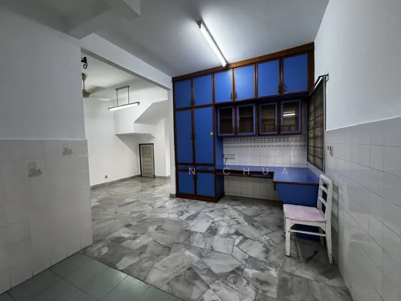 Kitchen features: blue cabinetry, white tiled backsplash, marble flooring, single-bowl stainless-steel sink, built-in countertop, window above sink, fluorescent ceiling lights, ceiling fan, open layout, white walls, wooden shelving, white chair; style: modern.