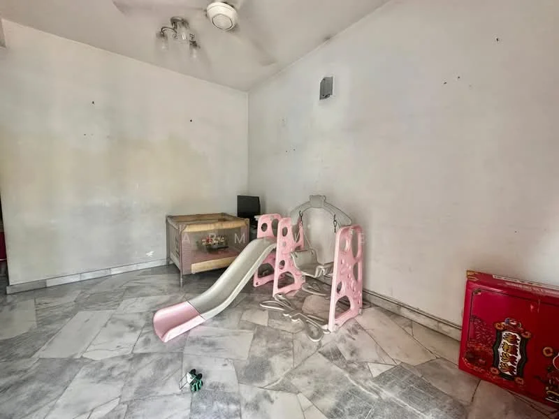 Room features: white painted walls, marble tile flooring, ceiling fan, play slide, wooden storage unit, small television, decorative red box.