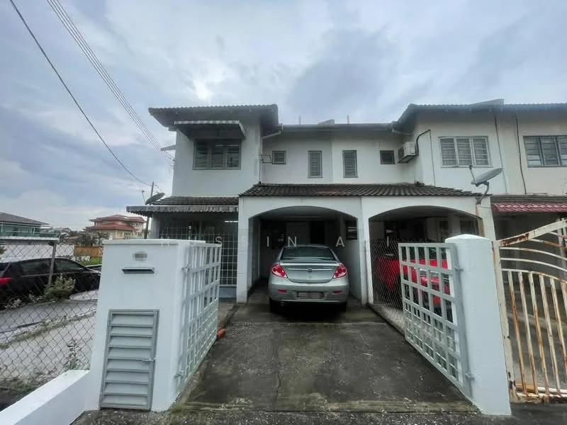 Exterior type: linked terrace house; features: two-storey building, car porch with space for two cars, white painted facade, brown tiled roof, front gate with metal grille, fenced perimeter, visible air conditioning units, driveway with concrete surface; style: modern.