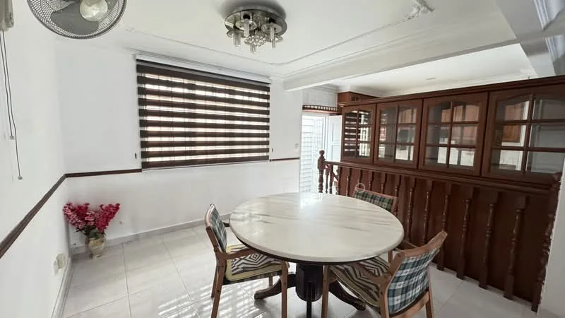 Dining features: round marble dining table, 4 dining chairs, white painted walls, tile flooring, ceiling fan with light, wooden railing, built-in wooden cabinetry, window with dual-layered blinds, decorative potted plant; style: modern.