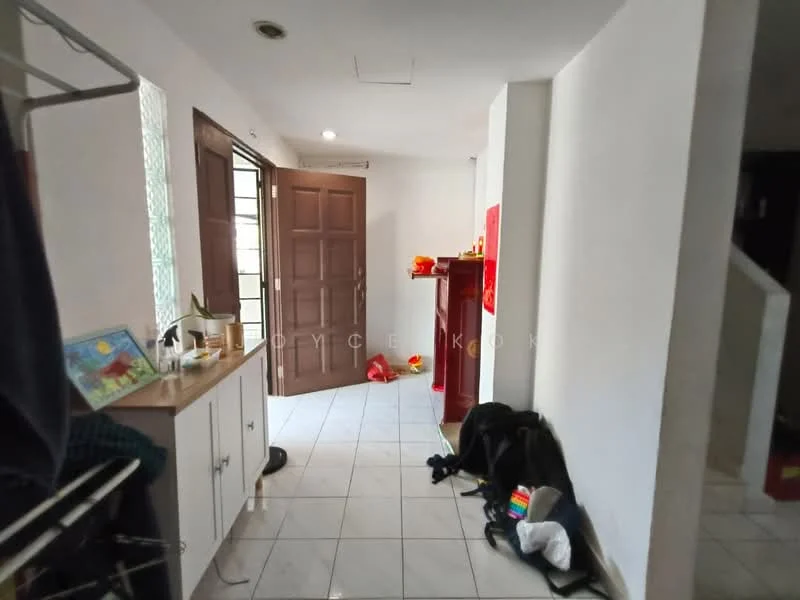 Room features: white painted walls, ceramic tile flooring, wooden door, glass window, open shelving unit, decorative painting, backpack on the floor, red object on the counter, scattered items on the floor.
