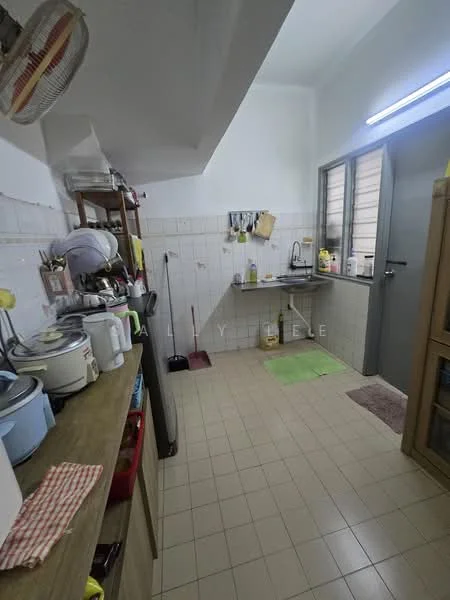 Kitchen features: tile flooring, white painted walls, single-bowl stainless-steel sink, chrome pull-down faucet, wooden countertop, built-in cabinets, microwave, rice cooker, kettle, broom, floor mat, window with metal grille, refrigerator.