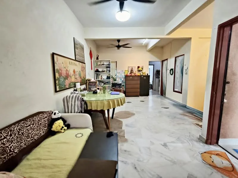 Living features: marble flooring, white painted walls, ceiling fan, sofa with patterned upholstery, round dining table, wooden cabinet, decorative wall art, shelves with decorative items, panda plush toy, open layout, natural light from adjacent room; style: modern.