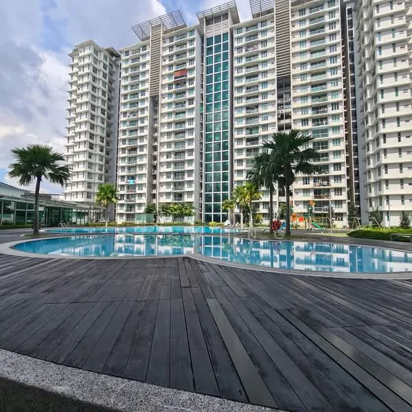 Exterior type: high-rise condominium; features: infinity pool, pool deck with wooden flooring, surrounded by palm trees, glass curtain wall facade, multiple storeys, landscaped garden area, children's playground visible, outdoor seating area, modern architectural design; style: modern.