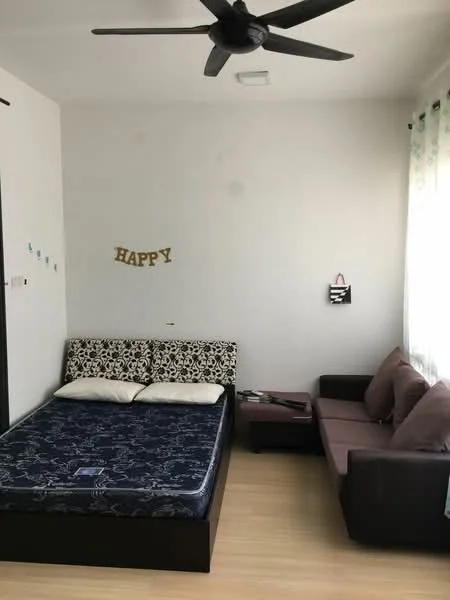 Bedroom features: queen-size bed with patterned headboard, mattress with blue cover, 2 white pillows, sofa in dark brown with beige cushions, wooden flooring, ceiling fan with 5 blades, white walls, curtains with floral pattern, decorative wall with 'HAPPY' letters; style: modern.