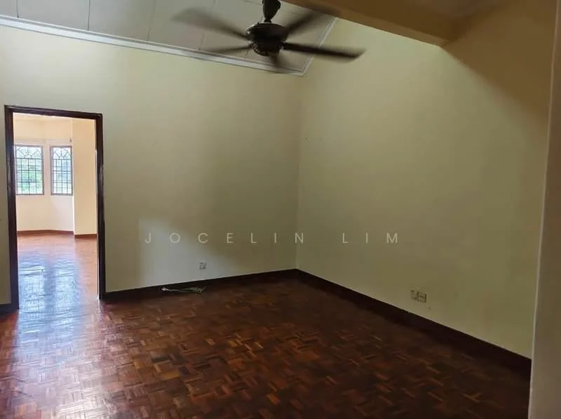 Room features: wooden flooring, cream painted walls, ceiling fan, large windows, doorway leading to another room, baseboards, no visible furniture.