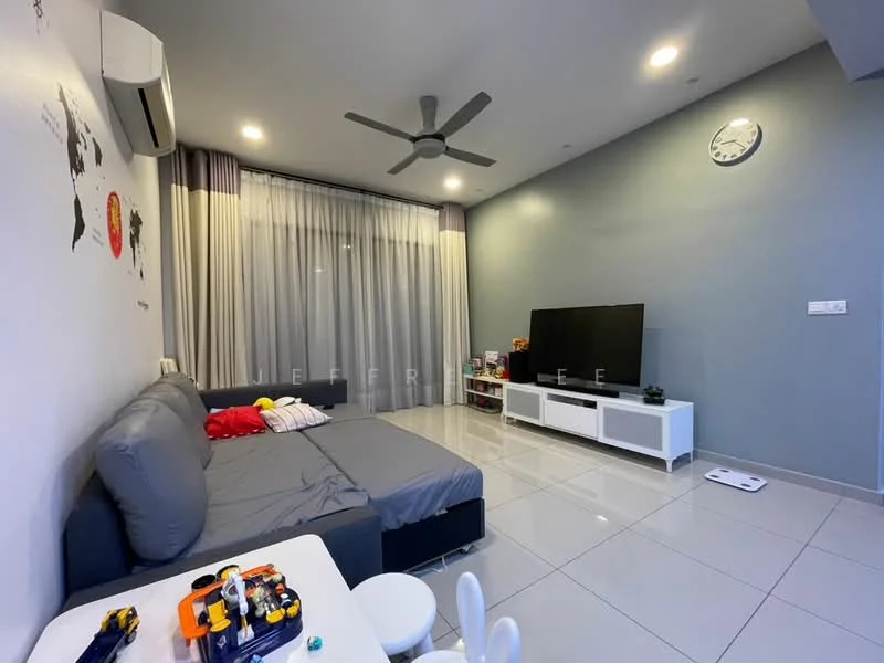 Living features: grey fabric sofa bed, white TV console, wall-mounted TV, 5-blade ceiling fan with light, large floor-to-ceiling windows with sheer curtains, light grey painted walls, white tiled flooring, decorative wall clock, children's toys on coffee table; style: modern.